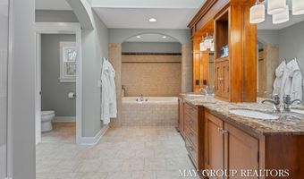5254 Canyon River Dr NE, Ada, MI 49301