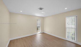 524 Muirfield Dr, Atlantis, FL 33462