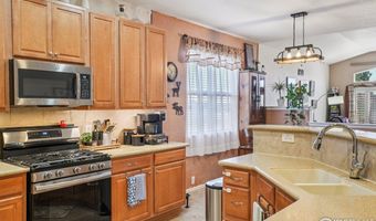 256 Homestead Way, Brighton, CO 80601