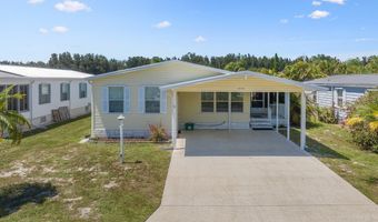 414 Macadamia Dr, Barefoot Bay, FL 32976