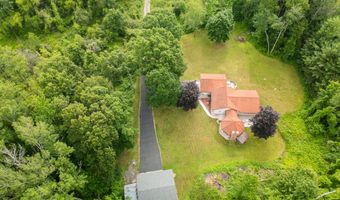 989 McCabe Ave NE, Ada, MI 49301