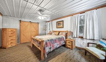 8074 Grosbeak Dr NW, Alden, MI 49612