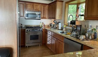 11282 S E Torch Lake Dr, Alden, MI 49612