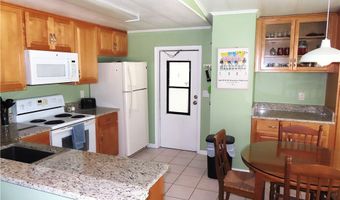 910 Dogwood Dr, Barefoot Bay, FL 32976