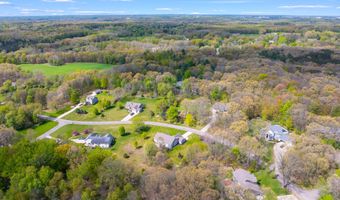 5730 Summerset Woods Dr, Alto, MI 49302