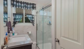 10311 SE Torch Lake Dr, Alden, MI 49612