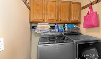 2264 Grand Valley Dr NE, Ada, MI 49301