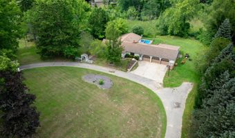 5855 Grand River Dr NE, Ada, MI 49301