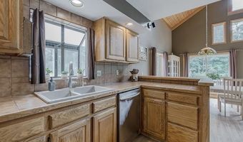 9038 Lahring Rd, Argentine, MI 48436