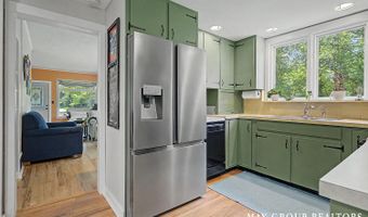 665 Honey Creek Ave NE, Ada, MI 49301