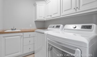 5254 Canyon River Dr NE, Ada, MI 49301