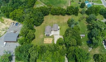 9038 Lahring Rd, Argentine, MI 48436