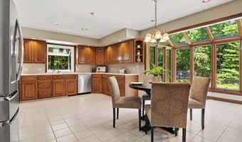385 Greentree Ln NE, Ada, MI 49301