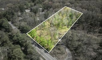 6050 Grand River Dr NE, Ada, MI 49301