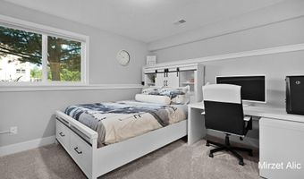 5220 Canyon River Dr NE, Ada, MI 49301