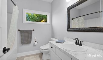 5220 Canyon River Dr NE, Ada, MI 49301