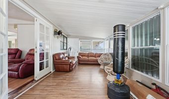 566 Dolphin Cir, Barefoot Bay, FL 32976