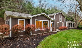 589 Grand River Dr NE, Ada, MI 49301