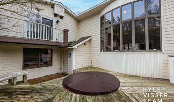 589 Grand River Dr NE, Ada, MI 49301