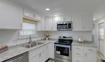 906 Wren Cir, Barefoot Bay, FL 32976