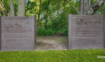 5220 Canyon River Dr NE, Ada, MI 49301