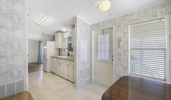 414 Macadamia Dr, Barefoot Bay, FL 32976
