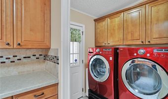 338 Macadamia Dr, Barefoot Bay, FL 32976