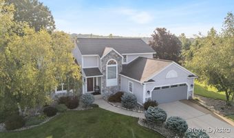 2264 Grand Valley Dr NE, Ada, MI 49301