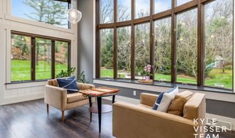 589 Grand River Dr NE, Ada, MI 49301