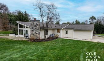 589 Grand River Dr NE, Ada, MI 49301