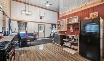 8074 Grosbeak Dr NW, Alden, MI 49612