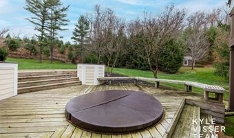 589 Grand River Dr NE, Ada, MI 49301