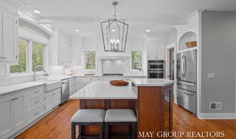5254 Canyon River Dr NE, Ada, MI 49301