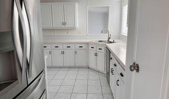 606 Dolphin Cir, Barefoot Bay, FL 32976
