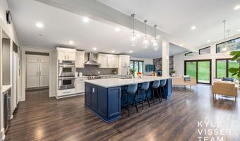589 Grand River Dr NE, Ada, MI 49301
