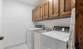 410 Greentree Ln NE, Ada, MI 49301