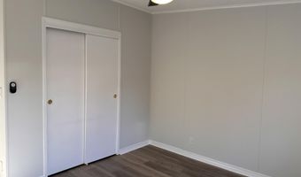 606 Dolphin Cir, Barefoot Bay, FL 32976