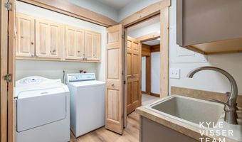 589 Grand River Dr NE, Ada, MI 49301