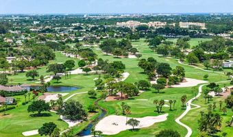 489 S Country Club Dr, Atlantis, FL 33462
