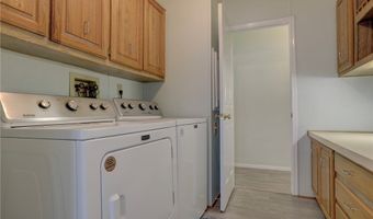 572 Dolphin Cir, Barefoot Bay, FL 32976