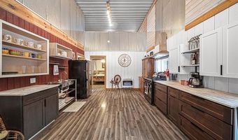 8074 Grosbeak Dr NW, Alden, MI 49612