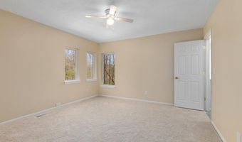 7721 Sun Quest Ridge Dr NE, Ada, MI 49301