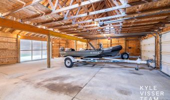 589 Grand River Dr NE, Ada, MI 49301