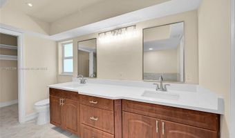 524 Muirfield Dr, Atlantis, FL 33462
