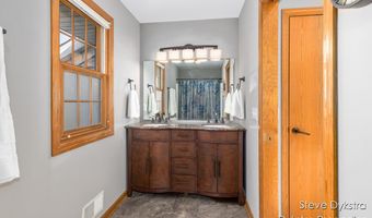 2264 Grand Valley Dr NE, Ada, MI 49301