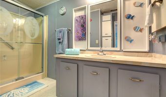 711 Amaryllis Dr, Barefoot Bay, FL 32976