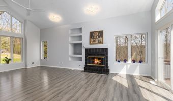 7721 Sun Quest Ridge Dr NE, Ada, MI 49301