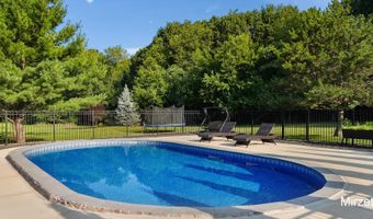 5220 Canyon River Dr NE, Ada, MI 49301