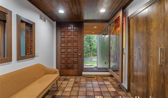 410 Greentree Ln NE, Ada, MI 49301