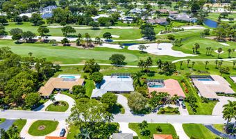 489 S Country Club Dr, Atlantis, FL 33462